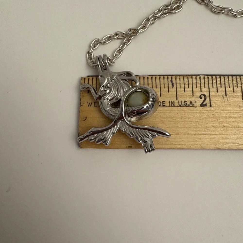 Gothic Like Mermaid Necklace features interior glow-in-the-dark orb!